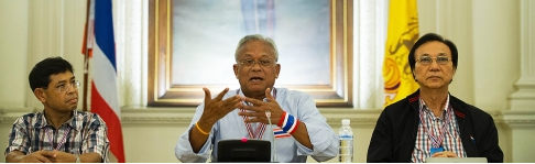Thai anti-government protest leader Suthep Thaugsuban (centre) talks during a press conference inside Government House in Bangkok on Tuesday. Photo: AFP Thai anti-government protest leader Suthep Thaugsuban - AFP
