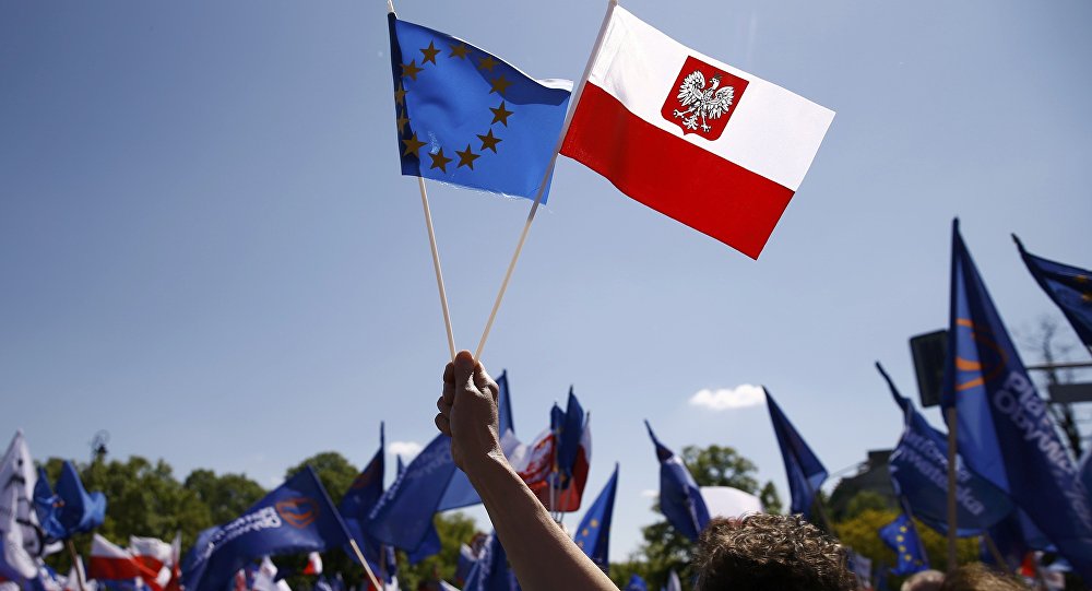EU and Polish flags (photo credit: Reuters/Kacper Pempel) EU and Polish flags (photo credit: Reuters/Kacper Pempel)