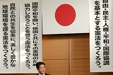 Japanese Prime Minister Shinzo Abe makes a speech during the annual rally on revising Japan's constitution (photo credit: The Diplomat) Japanese Prime Minister Shinzo Abe makes a speech during the annual rally on revising Japan's constitution (photo credit: The Diplomat)