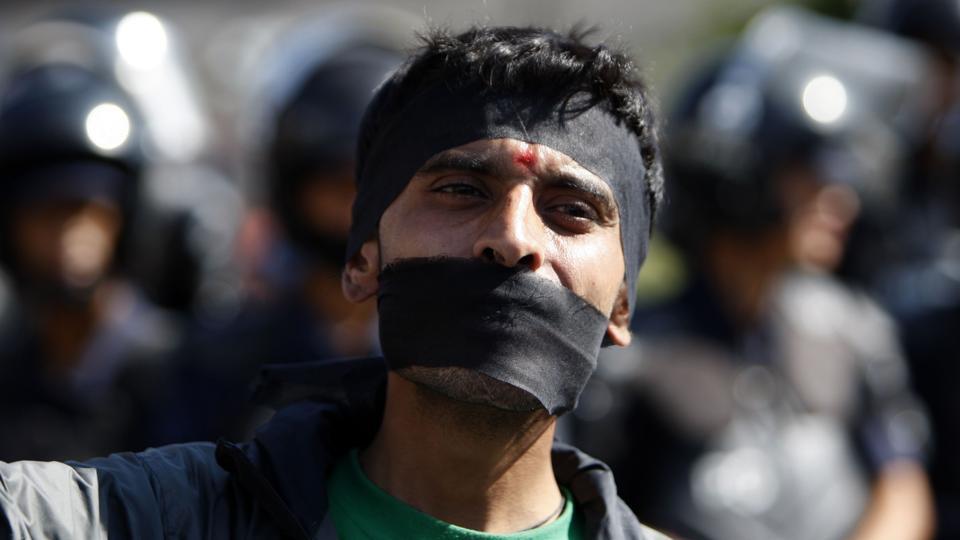 A Nepalese activist with others from the Federal Alliance - members of the Madhesi and ethnic communities - voicing anti-constitution concerns (photo credit: AFP) A Nepalese activist with others from the Federal Alliance - members of the Madhesi and ethnic communities - voicing anti-constitution concerns (photo credit: AFP)