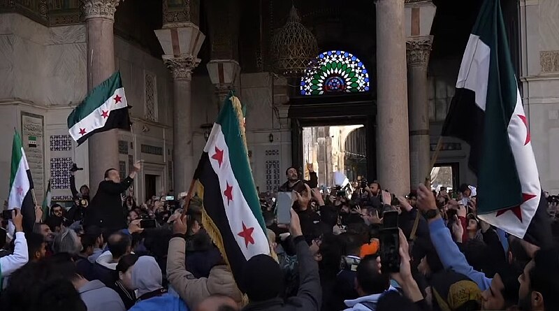 Celebrations at the Umayyad Mosque after the fall of the Assad regime (photo credit LLs via Wikimedia Commons) 