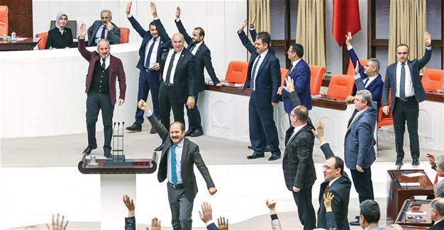 Mps of the ruling AKP party celebrate the approval of the amendments (photo credit: Hurriyet Daily News) MPs of the ruling AKP party celebrate the approval of the amendments (photo credit: Hurriyet Daily News)