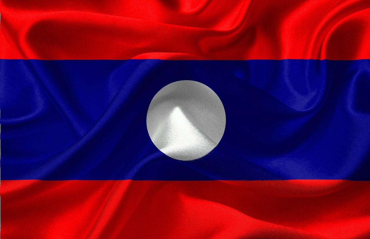 Flag of Lao PDR (photo credit: DavidRockDesign via pixabay)