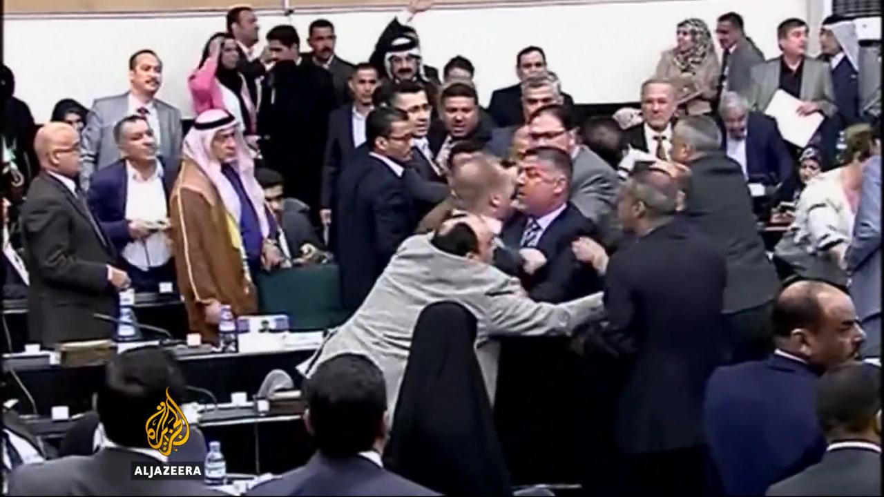 Iraqi MPs tussle over removal of Speaker (photo credit: Aljazeera) Iraqi MPs tussle over removal of Speaker (photo credit: Aljazeera)