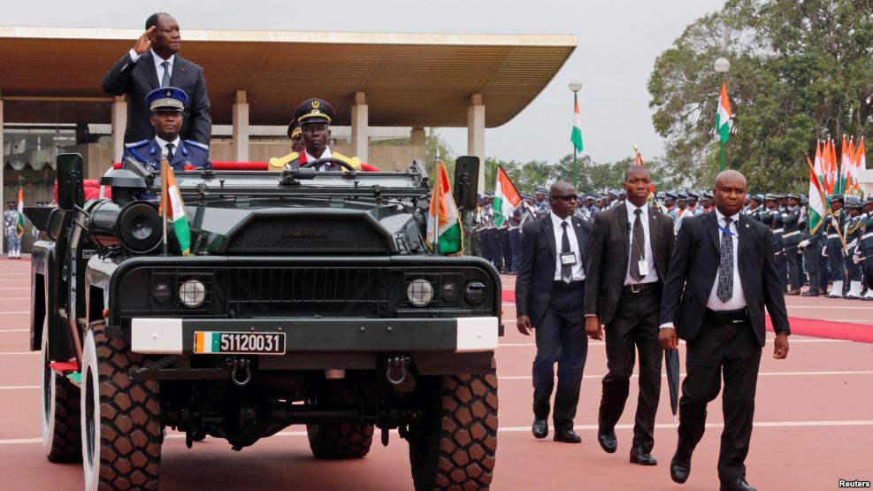 Ivory Coast's President Alassane Ouattara in a parade to commemorate the country's 56th Independence Day (Photo credit: Reuters) Ivory Coast's President Alassane Ouattara in a parade to commemorate the country's 56th Independence Day (Photo credit: Reuters)