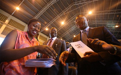 Ms Adhiambo Opondo (left) gives Cord co-principal Moses Wetangula a booklet, as Cord leader Raila Odinga (centre) looks on at Bomas of Kenya in Nairobi on April 23, 2015 after the launch of 'Okoa Kenya' Bill (photo credit: Evans Habil/Nation Media Group) Ms Adhiambo Opondo (left) gives Cord co-principal Moses Wetangula a booklet, as Cord leader Raila Odinga (centre) looks on at Bomas of Kenya in Nairobi on April 23, 2015 after the launch of 'Okoa Kenya' Bill (photo credit: Evans Habil/Nation Media Group)