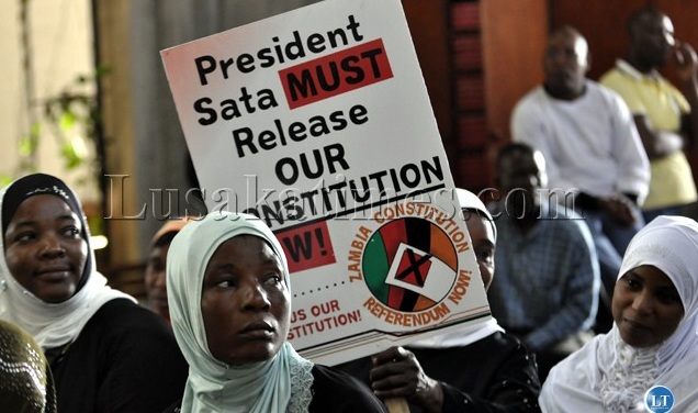 Zambian muslim Women raise a placard during gathering demanding release of the draftConstitution; C/Flickr/LT Zambian muslim Women raise a placard during gathering demanding release of the draftConstitution; C/Flickr/LT