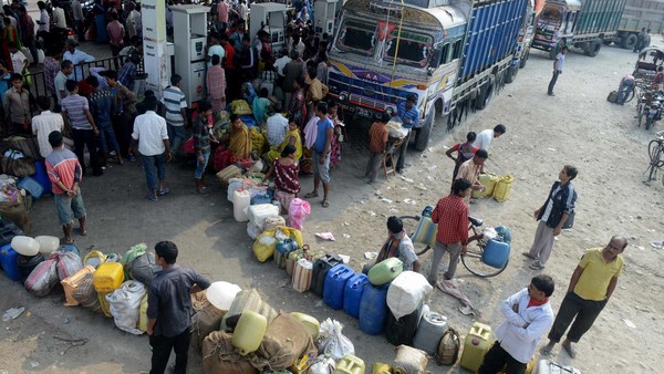 Queue for petrol near the India-Nepal border (photo credit: Financial Times) Queue for petrol near the India-Nepal border (photo credit: Financial Times)
