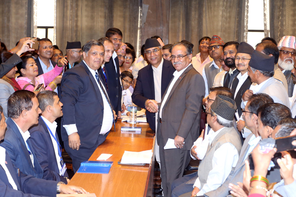 Dahal shakes hands with Deuba after filing his candidacy for the post of Prime Minister on Tuesday (photo credit: RSS) Dahal shakes hands with Deuba after filing his candidacy for the post of Prime Minister on Tuesday (photo credit: RSS)