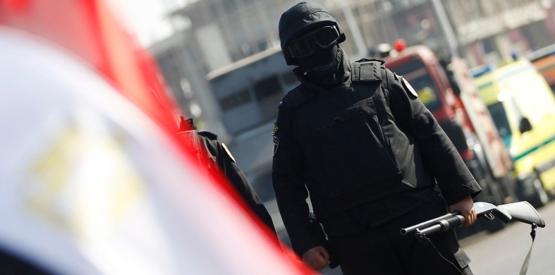A member of the security forces in Cairo, January 28, 2014. (Amr Abdallah Dalsh / Courtesy Reuters) A member of the security forces in Cairo, January 28, 2014. (Amr Abdallah Dalsh / Courtesy Reuters)