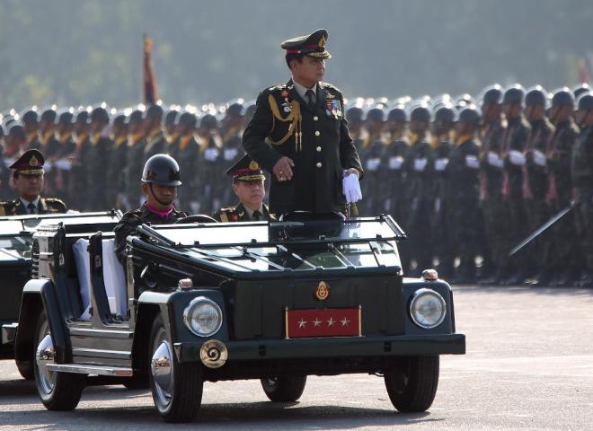General Prayuth Chan-ocha inspects the troops on the Thai Armed Foces Day (photo credit: AFP) General Prayuth Chan-ocha inspects the troops on the Thai Armed Foces Day (photo credit: AFP)