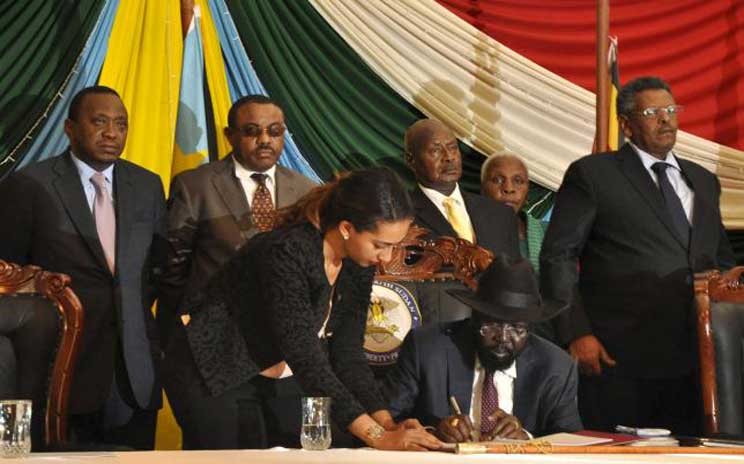 South Sudan’s President Salva Kiir (seated) signs a peace agreement in Juba, August 26, 2015. (Photo credit: Reuters/Jok Solomu) South Sudan’s President Salva Kiir (seated) signs a peace agreement in Juba, August 26, 2015. (Photo credit: Reuters/Jok Solomu)
