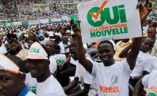 Supporters of the 'yes' for a new constitution campaign (photo credit: REUTER/Luc Gnago)