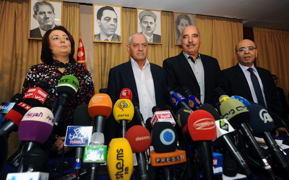 A photo taken on September 21, 2013 shows Tunisian mediators (LtoR) the President of the Tunisian employers union (UTICA), Wided Bouchamaoui, Secretary General of the Tunisian General Labour Union (UGTT) Houcine Abbassi (L) , President of the Tunisian Human Rights League (LTDH), Abdessattar ben Moussa and the president of the National Bar Association, Mohamed Fadhel Mahmoud at a press conference in Tunis. (photo credit: Fethi Belaid / AFP / Getty Images) A photo taken on September 21, 2013 shows Tunisian mediators (LtoR) the President of the Tunisian employers union (UTICA), Wided Bouchamaoui, Secretary General of the Tunisian General Labour Union (UGTT) Houcine Abbassi (L) , President of the Tunisian Human Rights League (LTDH), Abdessattar ben Moussa and the president of the National Bar Association, Mohamed Fadhel Mahmoud at a press conference in Tunis. (photo credit: Fethi Belaid / AFP / Getty Images)