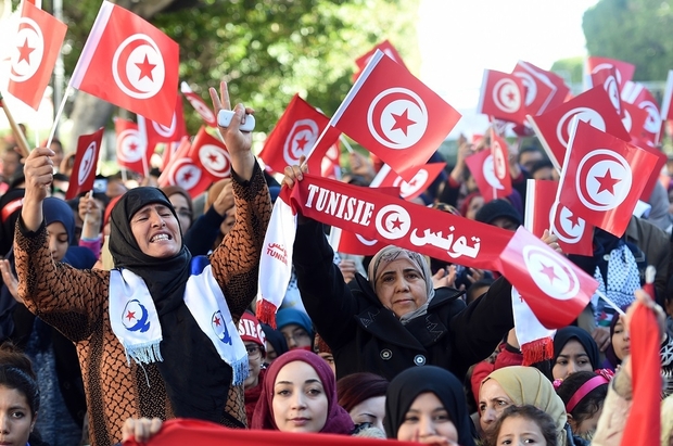 Tunisian women at a rally in Tunis marking the 5th anniversary of the 2011 revolution (photo credit: AFP) Tunisian women at a rally in Tunis marking the 5th anniversary of the 2011 revolution (photo credit: AFP)